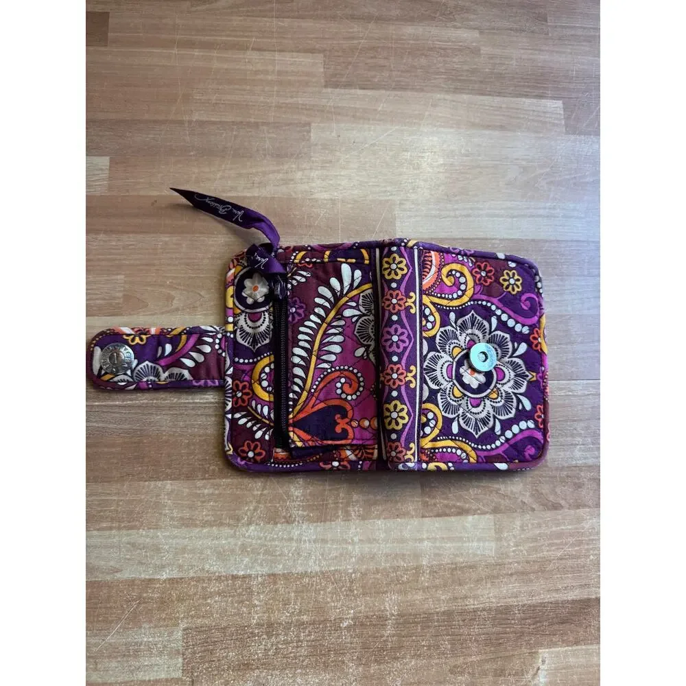 Vera Bradley Turnlock Wallet in the retired Safari Sunset pattern.